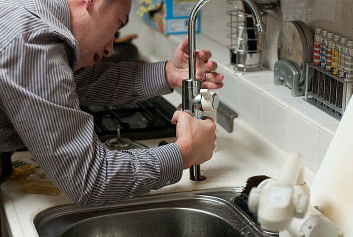 Plumber kitchen sink installation